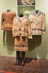 Fringed leather jackets called cueras
and outfit for dancing to huapangos and sones from Tamaulipas displayed at the Museo de Arte Popular in Mexico City MAPElNorte101.JPG