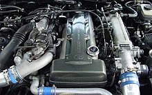 Engine bay of the Toyota Supra JZA80, showing the 2JZ-GTE engine MK4 supra engine bay.JPG