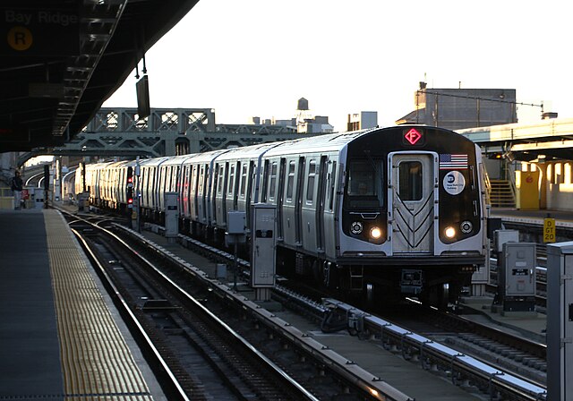 Coney Island-bound F express train of R160s passing Fourth Avenue