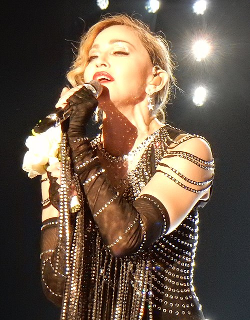 "Diamonds" became Rihanna's twelfth number one on the US Billboard Hot 100, tying her with Madonna (pictured) and the Supremes as the artists with the