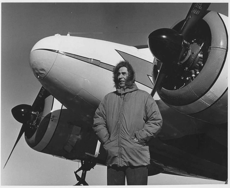 File:Man beside plane vintage aging stock photo.jpg