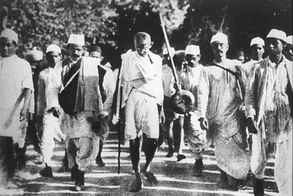 Mahatma Gandhi leading the famous 1930 Salt March, a notable example of satyagraha.