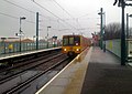 Metro arriving at St Peters station, Sunderland by Safc cal - panoramio.jpg