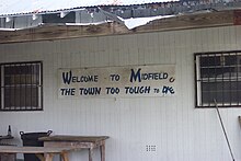 A sign in the community of Midfield Midfield, TX, The Town Too Tough to Die.JPG