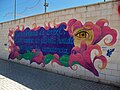 Mural de la asociación cultural Murales Amaras en el exterior del campo de fútbol Julián Torralba, 2022-09-10.