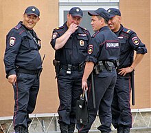 A group of Russian Ministry of Internal Affairs officers conversing in 2018 Mvd police.jpg