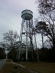 The geographical reference of this water tower, located at the intersection of Nelson and Rommel avenues, is 32°6′49.7″N 81°9′16.4″W.