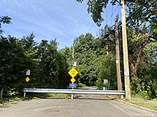 The dead-end on Old Courthouse Road, just south of the historic overpass which used to carry it over the Long Island Motor Parkway. Old Courthouse Road Overpass, Manhasset Hills, Long Island, New York October 2, 2021 D.jpg