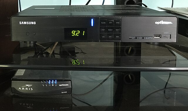 Optimum HD cable box (top) and cable modem, in place and connected