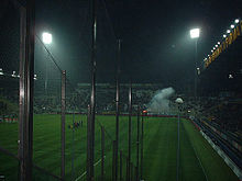 Parma fans let off a flare before their 2001-02 UEFA Cup domestic encounter with Utrecht ParmaTwente.jpg