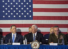 Pence (center) speaks at the sixth meeting of the revived council in 2019 Pence speaks at National Space Council (48588113991).jpg