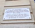 la plaque sur le portail des manèges