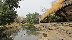 Prehistoric Painted Rock Shelters at Chatarbhuj Nala outlook.jpg