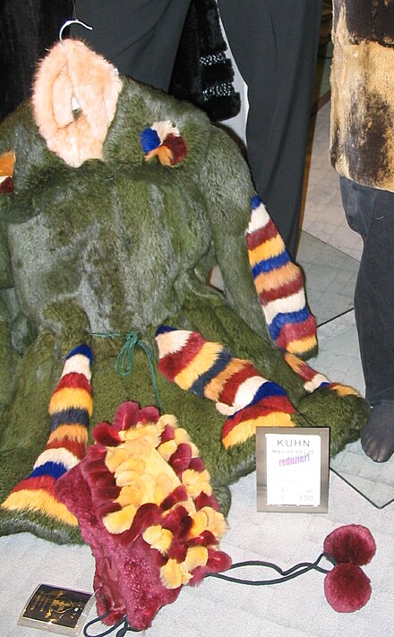 A child's multicoloured rabbit coat and cap – rabbit became popular because it could be dyed to create different effects or sheared to imitate other animal furs