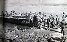 Infantrymen of the 5th Division, Third Army, board a LCVP to cross the Rhine at Nierstein. Rhine Crossing - U.S. Third Army infantrymen board a LCVP to cross the Rhine.jpg