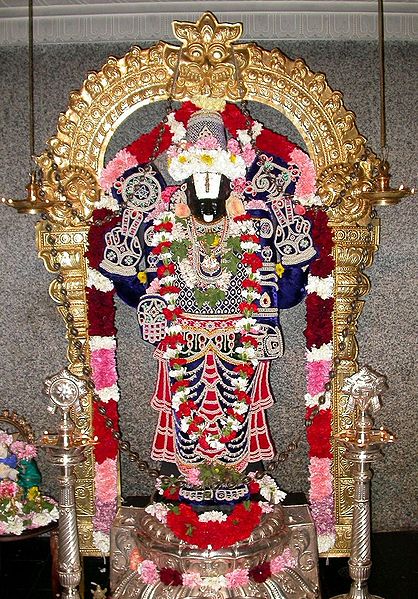 An idol of Venkateshvara in a temple of Miami decked with a garland made of 108 shaligrama shilas