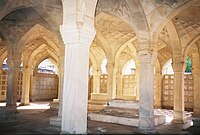 Sunlit interior of the Chausath Khamba.JPG