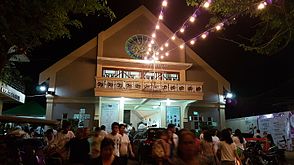 The Facade Hearts of Jesus and Mary Parish during nighttime.