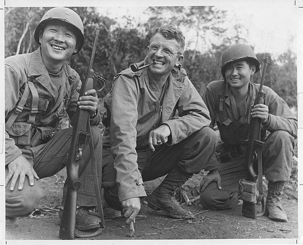 Brig Gen Frank Merrill, poses with Japanese-American interpreters T/Sgt. Herbert Miyasaki and T/Sgt. Akiji Yoshimura in Burma (1 May 1944).