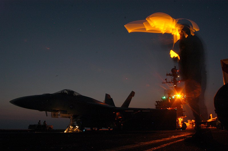 File:US Navy 050919-N-2541H-001 An Aviation Boatswain Mate signals to an F-A-18E Super Hornet that they are clear for launch.jpg