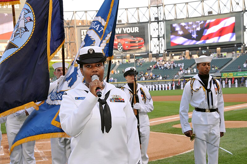 File:US Navy 100602-N-8848T-428 Fire Controlman 1st Class Jocelyn Elmore sings the national anthem during the 25th annual Chicago White Sox Navy Night.jpg