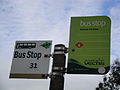 The bus stop flags at the Botanic Garden, Ventnor, Isle of Wight in May 2012. It is served by Southern Vectis buses on route 6 and Island Minibus Service buses on route 31. Branding for the Island Minibus Service can be seen on their flag, added since they took the route over. Route 31 is now run by Minibus Plus.