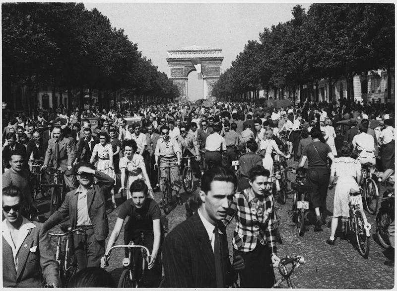 File:WWII, Europe, France, Civilians, "Hour of Triumph, Parisians join the parade down Champs Elysees from the Arch de... - NARA - 196298.jpg