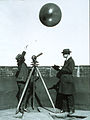 Early testing of hydrogen filled balloons for radiosonde measurements Theodolite used to track balloon to limit of visibility.