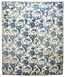 This early American wholecloth quilt was made in the Colonial period, c. 1760-1800. The blue resist fabric includes bold, fanciful botanical motifs. Collection of Bill Volckening. Wholecloth Blue Resist Quilt, c. 1760-1800.jpg