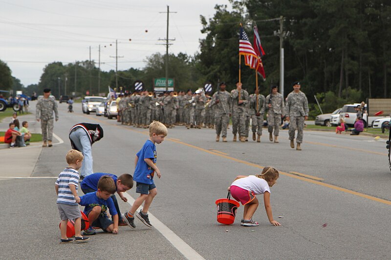 File:'Dog Face' soldiers march in 11th Annual Wiregrass Festival Parade 140927-A-TN552-006.jpg