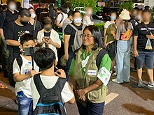 People wearing mask amidst a pro-democracy protest in Bangkok thpniiy e`iiydsriichay Thapanee Eadsrichai Bangkok protest 2020 01.jpg