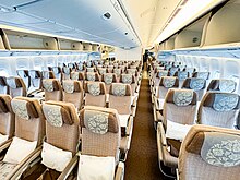 Economy class on a Boeing 777-300ER 14-DEC-2023 - MU220 FRA-PVG (B-2002 - B777-300ER) (02).jpg
