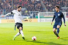 Öztunalı (left) in action for Germany against England U21 in 2017