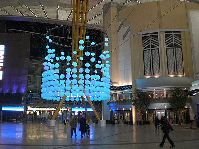 The O2 concourse. The arena entrance can be seen in the background. Designed by Jordan Parnass Digital Architecture.