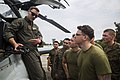 CAMP HANSEN, Okinawa, Japan (March 28, 2020) Capt. Will Nevinwoods, an AH-1Z Viper helicopter pilot with Marine Medium Tiltrotor Squadron (VMM) 265 (Reinforced), 31st Marine Expeditionary Unit (MEU), explains the capabilities of the AH-1Z Viper to Marines from Combined Anti-Armor Team (CAAT), Battalion Landing Team, 1st Battalion, 5th Marines, 31st MEU, during a forward arming and refueling point exercise. During the evolution, the MEU's Combined Anti-Armor Team conducted a ship to shore movement from amphibious assault ship USS America (LHA 6) before securing a landing zone for the FARP. America, flagship of the America Expeditionary Strike Group, 31st MEU team, is operating in the U.S. 7th fleet area of operations to enhance interoperability with allies and partners and serve as a ready response force to defend peace and stability in the Indo Pacific region. (U.S. Marine Corps photo by Lance Cpl. Kenny Nunez Bigay)