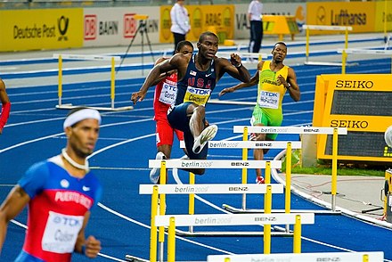 Kerron Clement running the 400 m hurdles in Berlin, 2009 (at center)