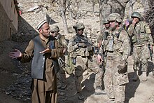 45th Infantry Brigade Combat Team and Afghan soldiers speaking with a civilian in 2011 111120-A-5494G-111 (6538016373).jpg