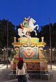 A young girl looking at a St Pauls statue during St Pauls feast in Valletta