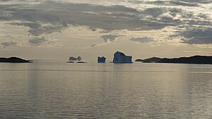 Icebergs stranded in the waterways of the Aasiaat archipelago, Greenland, near the Aasiaat harbor