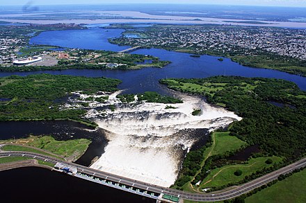 Macagua Dam with the city and confluence of the Caroní and Orinoco rivers in the background