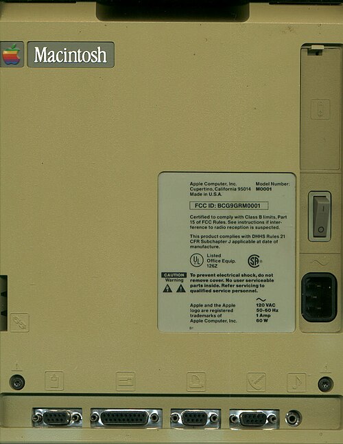 Back case of an unaltered original Macintosh (sold January–November 1984). The majority of 128K machines made after November 1984 have the label "Maci
