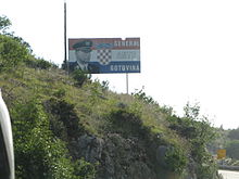 A billboard showing a picture of Ante Gotovina on a road near Dubrovnik. Ante Gotovina Dubrovnik.JPG