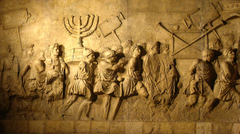 Image 22Relief from the Arch of Titus in Rome depicting a menorah and other spoils from the Temple of Jerusalem carried in Roman triumph. (from Roman Empire)