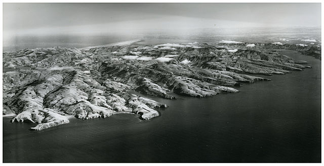 Banks Peninsula, with Lyttelton Harbour / Whakaraupō on the right and Lake Ellesmere / Te Waihora in the background