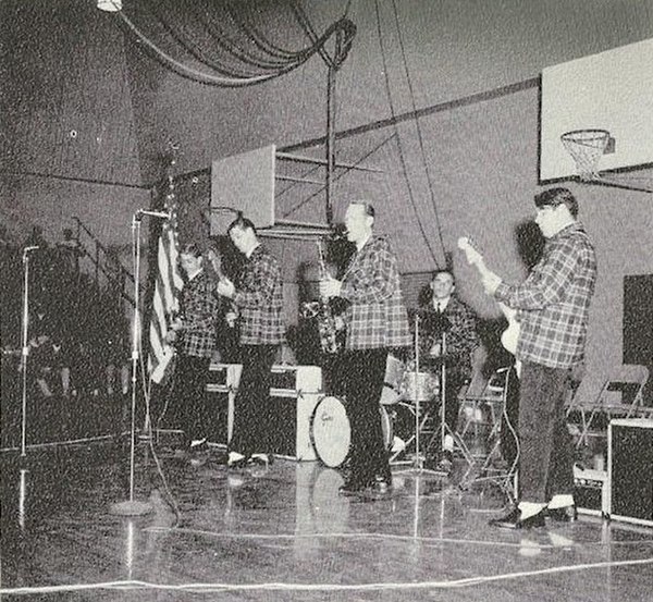 The Beach Boys, in Pendleton outfits, performing at a local high school, late 1962