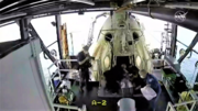 Thumbnail for File:Bob Behnken being offloaded from Crew Dragon Endeavour.png