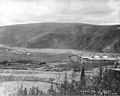 Bonanza Basin with Yukon Gold Company machine shops and furrows of dredged soil in background, Yukon Territory, August 4, 1914 (AL+CA 2213).jpg