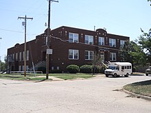 The former Booker T. Washington High School is now a community center. Booker T Washington School Enid.jpg