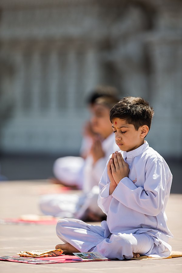 Boy offering personal worship