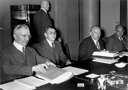 Reichsbank President Hjalmar Schacht (left) at the June-July 1934 Transfer Agreement negotiations Bundesarchiv Bild 183-H29131, Reichsbank, Sitzung der Transferkommission.jpg